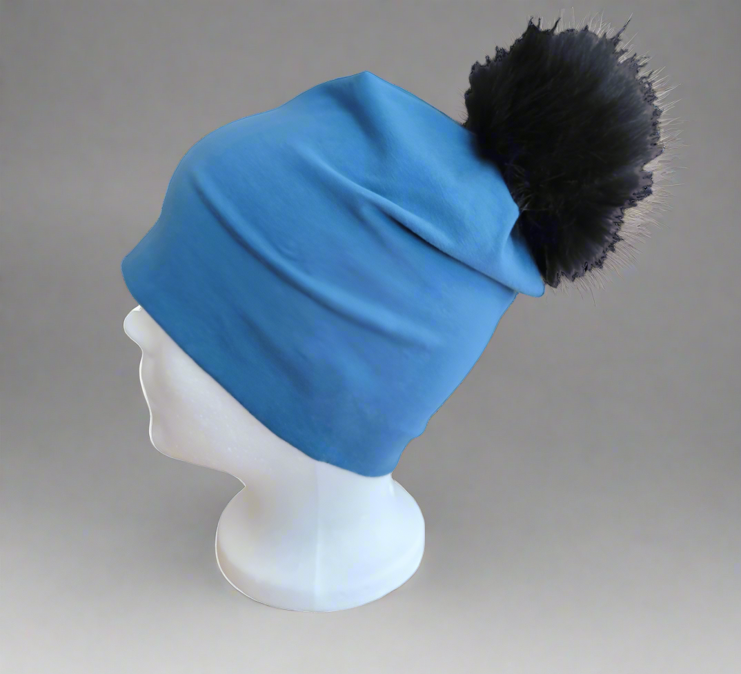 Tuques à pompons détachables