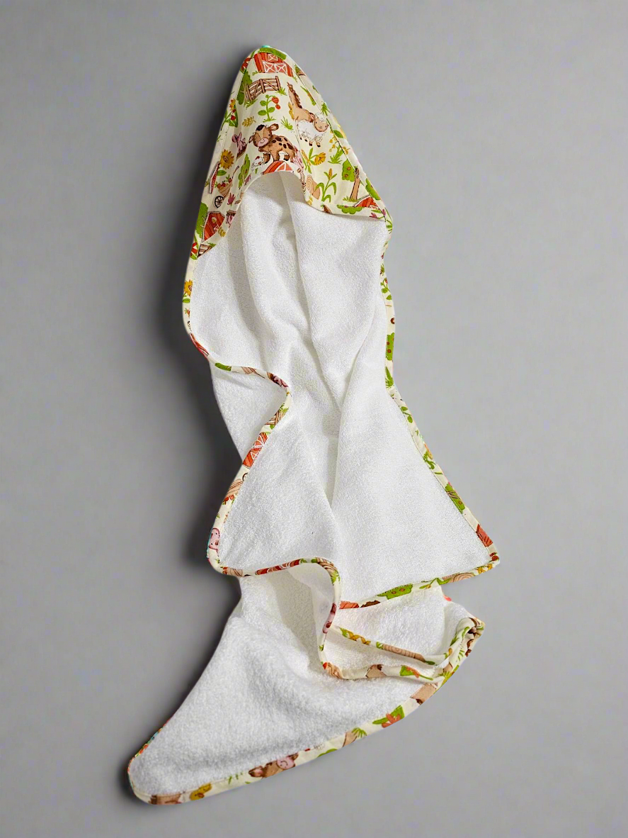 Ens. serviette de bain, lingettes (2) et protège carnet de santé pour bébé