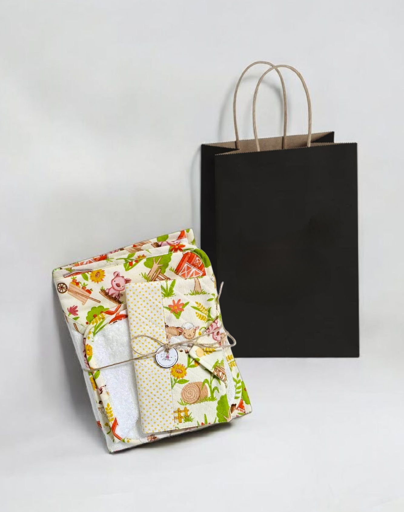 Ens. serviette de bain, lingettes (2) et protège carnet de santé pour bébé